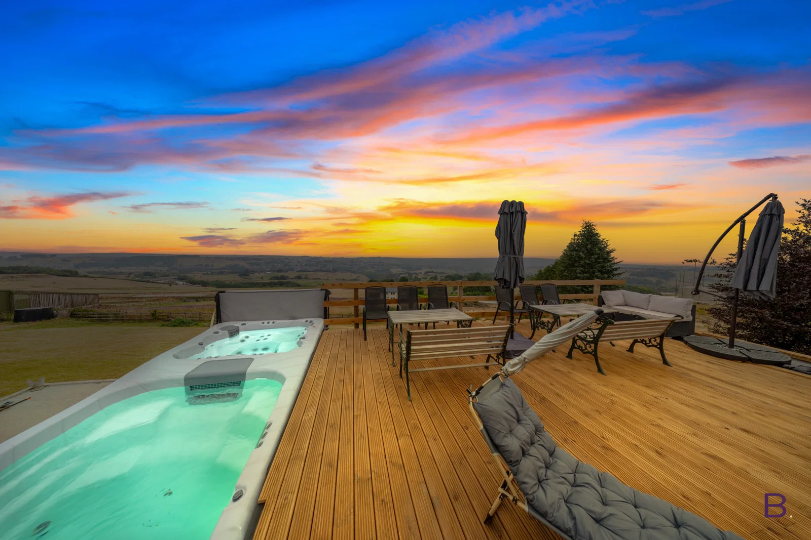 Sunset over the terrace at Mountain Hall
